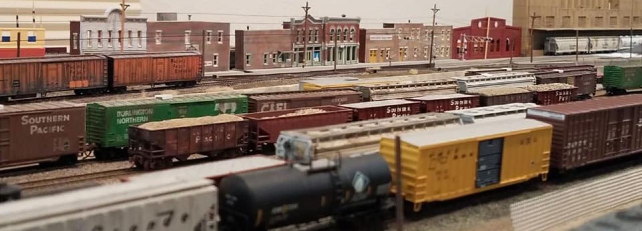 RAILROAD AVENUE ON MY N SCALE MODEL RAILROAD A VIEW OF THE BUSY YARD ON MY N SCALE MODEL RAILROAD, WITH A ROW OF BUSINESSES IN THE BACKGROUND ON RAILROAD AVENUE.