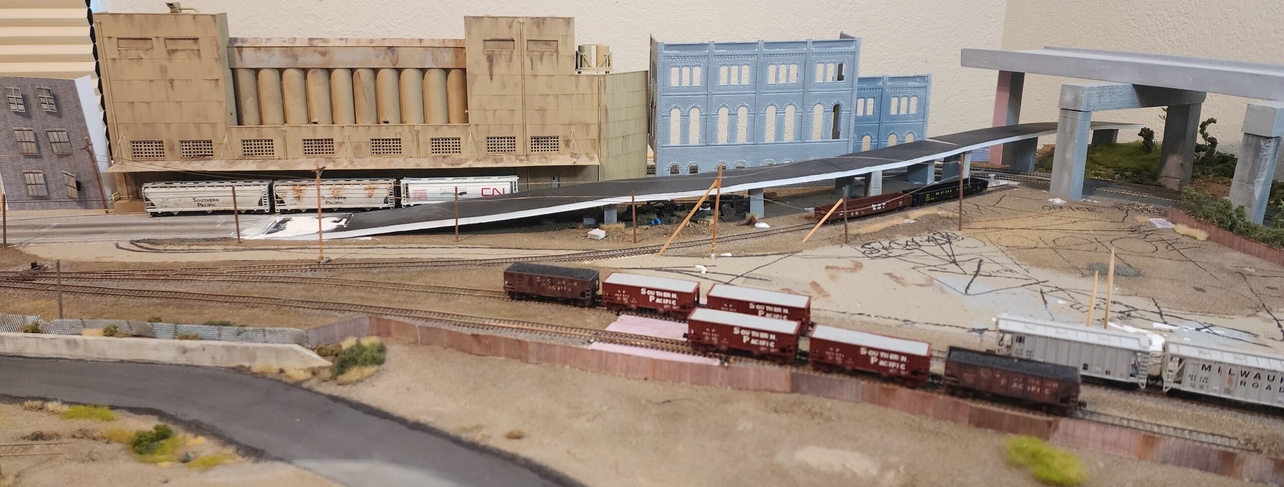 HERE WE SEE THE GENERAL MILLS FACTORY ON MY N SCALE LAYOUT AFTER WEATHERING TECHNIQUES