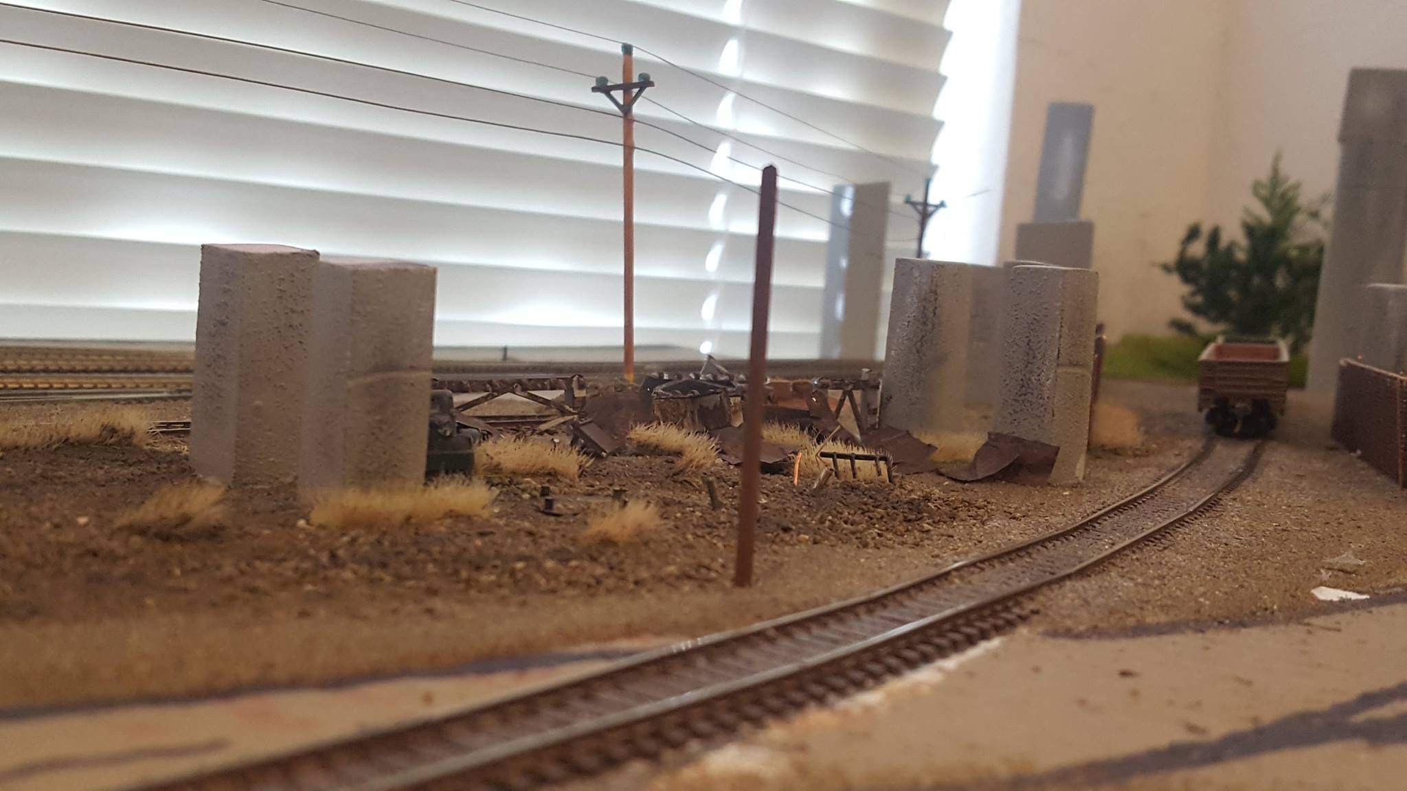 A VIEW OF THE SMALL JUNIK PILE SCENE FROM A DIFFERENT ANGLE ON MY N SCALE LAYOUT