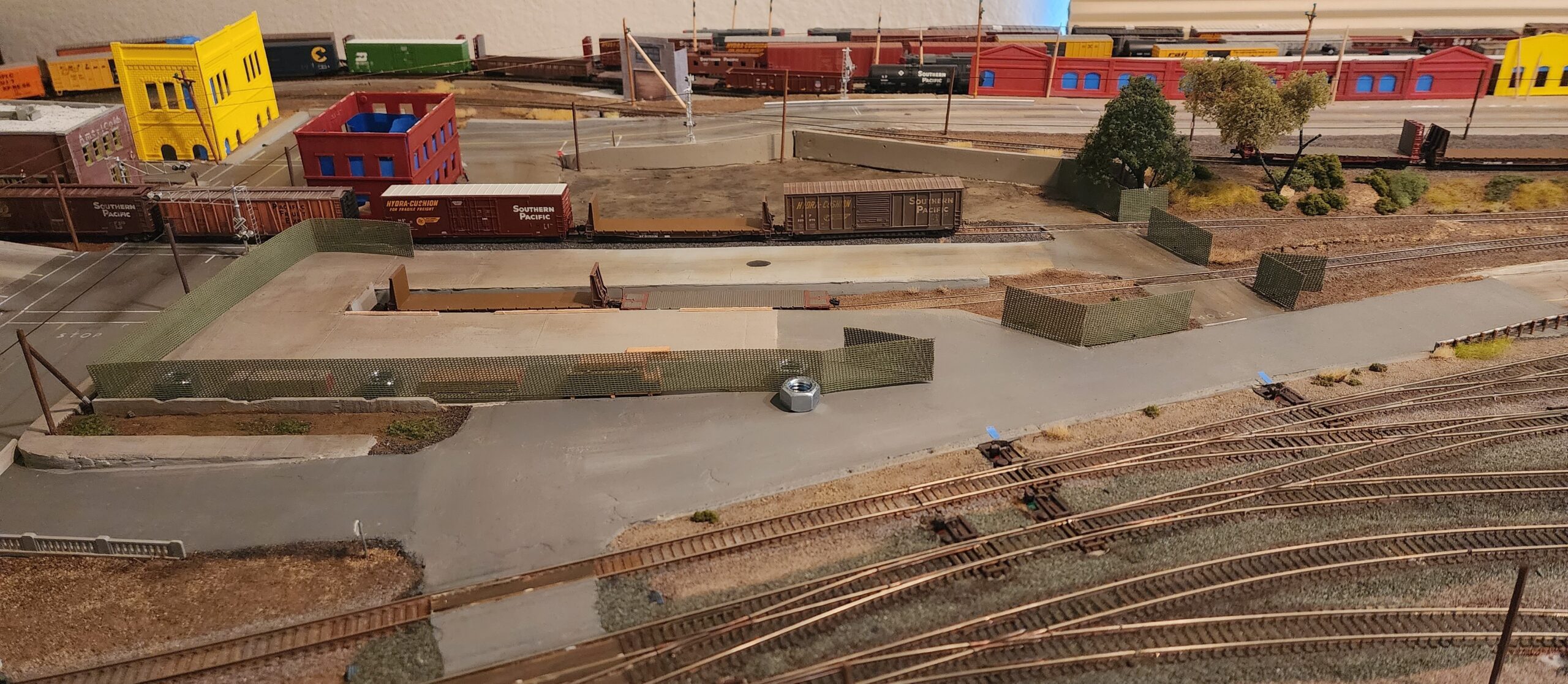a paved lumber unloading area on my model railroad