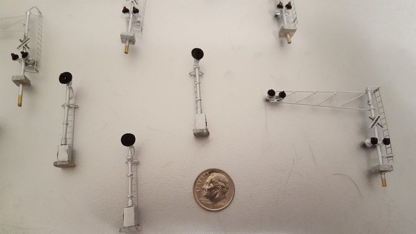 THE SIGNAL HEADS AND RAILROAD CROSSING CANTILEVERS I SCRATCH BUILT FOR MY N SCALE LAYOUT